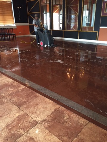 A Gulfside cleaner burnishing a polished stone floor to a shine